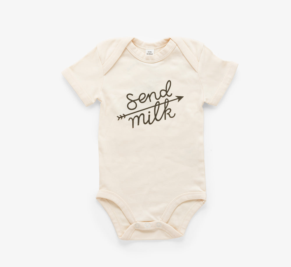 Cream coloured baby vest with send milk printed in scroll lettering in black with an arrow